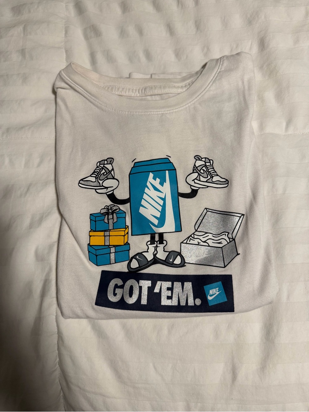Nike White Short-Sleeve 'Got 'Em' Graphic Tee with Blue and Yellow Accents